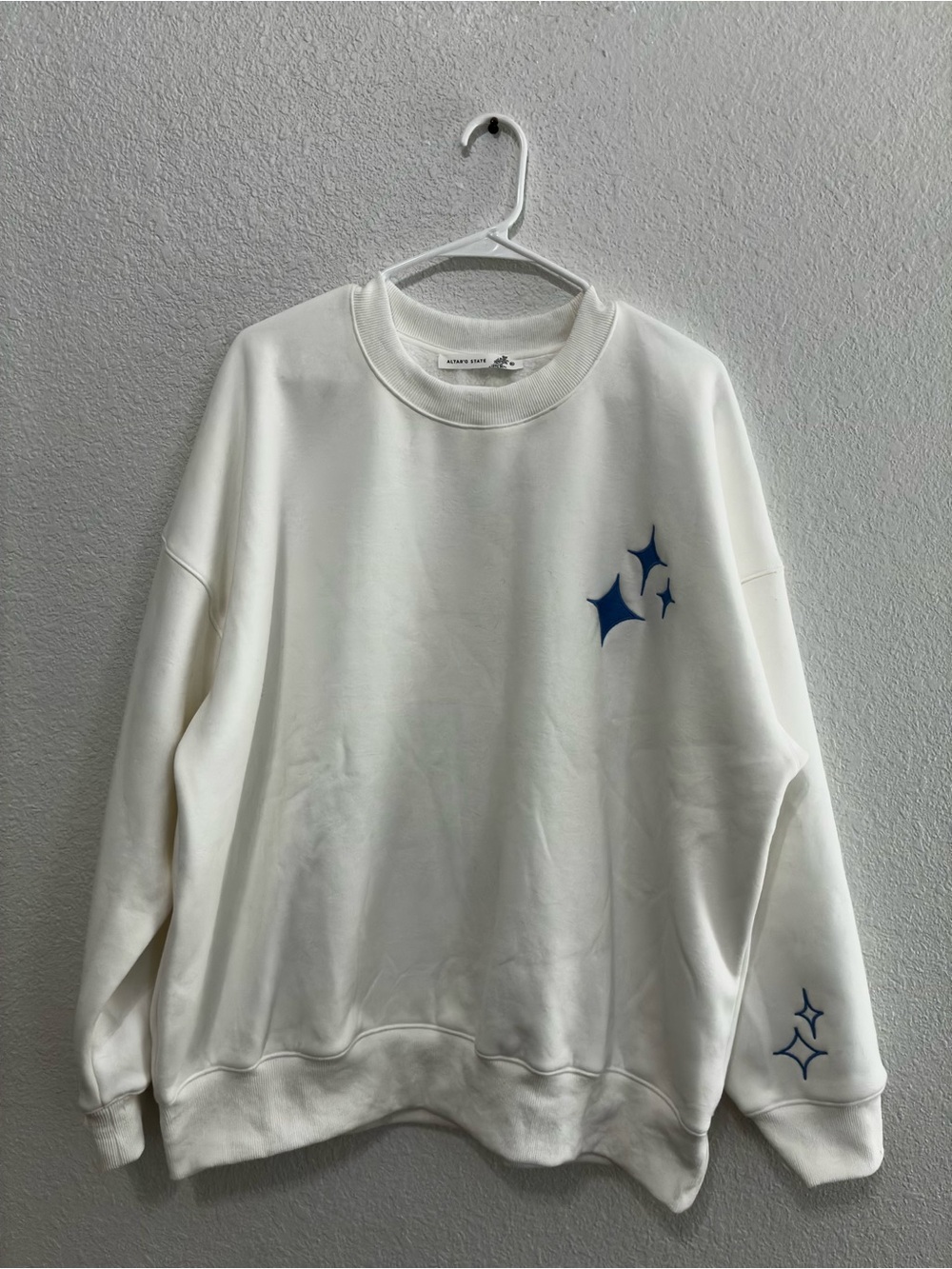 Altar'd State White Crewneck Sweater with Blue Star Motifs